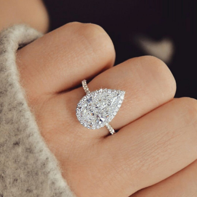 White Moissanite Pear Shape Ring